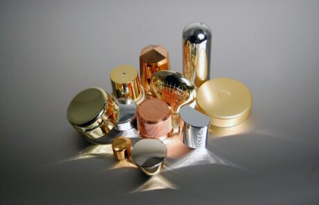 Vacuum metalized decorative packaging components with high-g Vacuum metalized decorative packaging components with high-gloss metallic finish